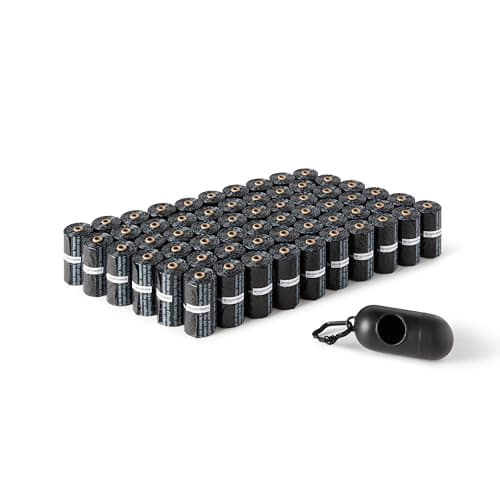 Amazon Basics - Bolsas para excremento de perro, con dispensador, Negro, 900 unidades (60 rollos), mejoradas para garantizar que no haya fugas, sin fragancia, incluye clip para correa